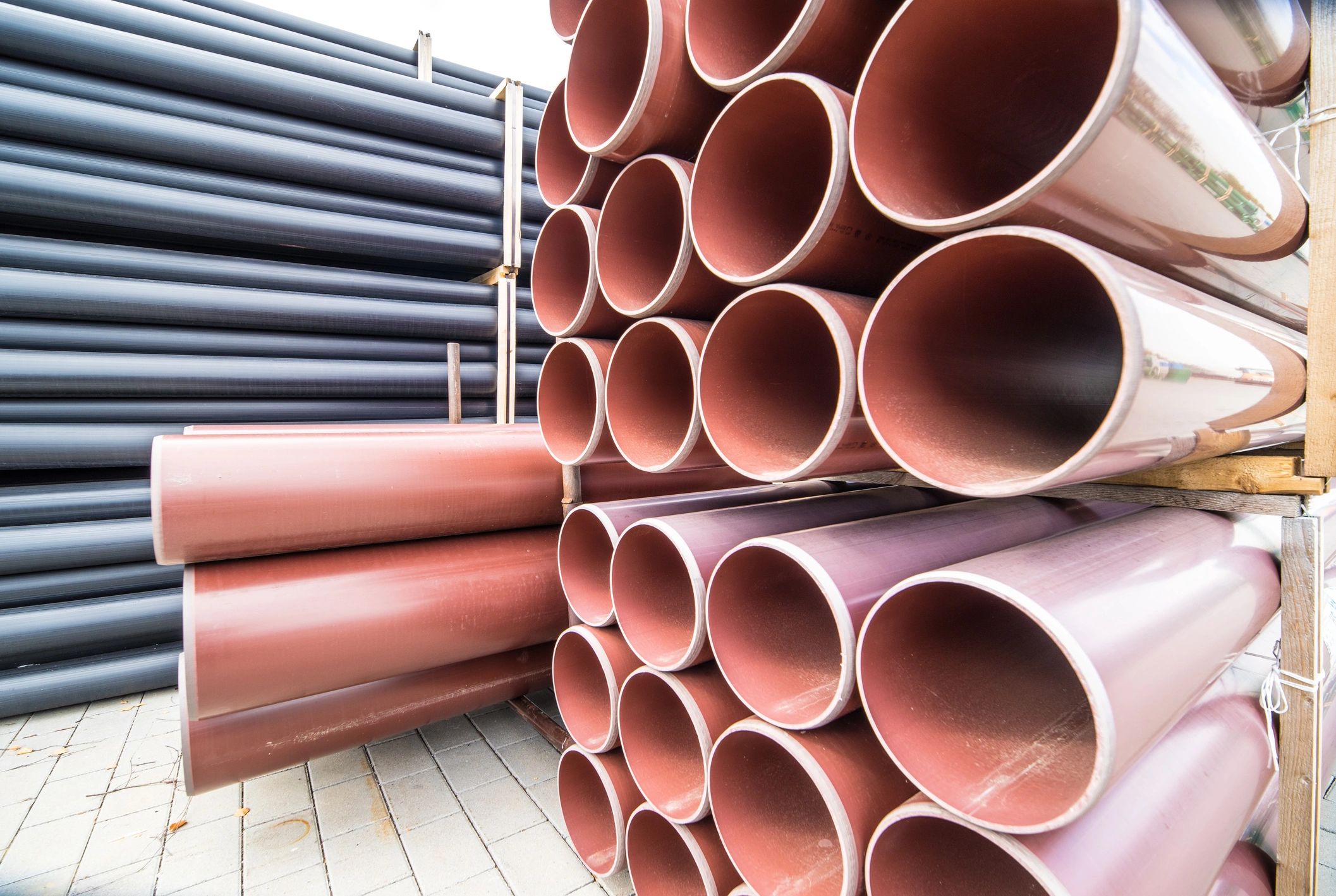 Stacks of plastic utility pipes