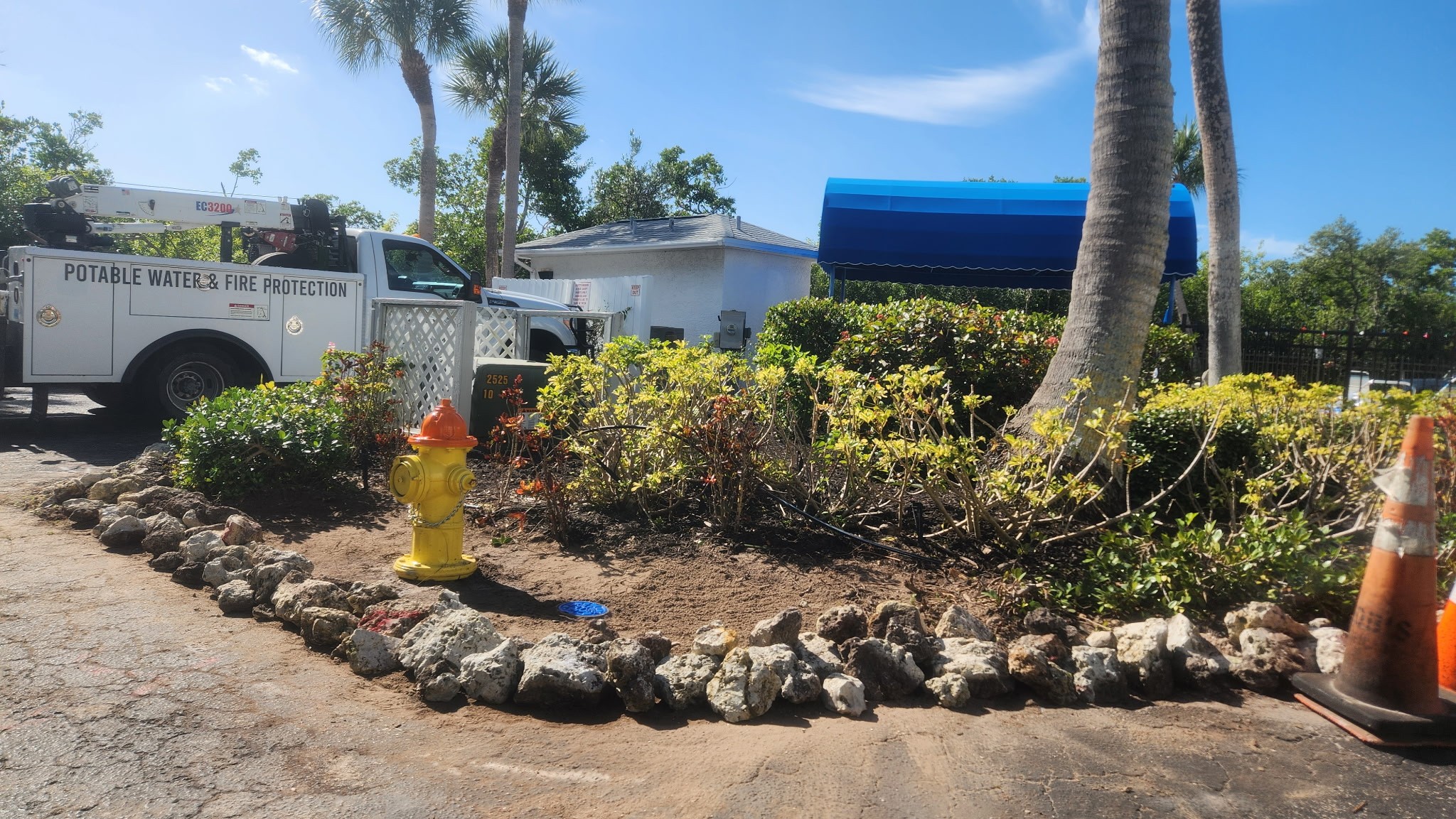 Fire hydrant installation near utility service truck