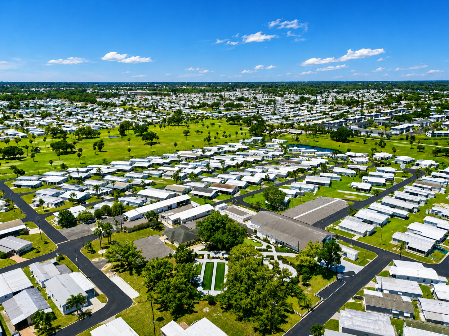 Aerial view of Village on the Greens mobile home community in 2025